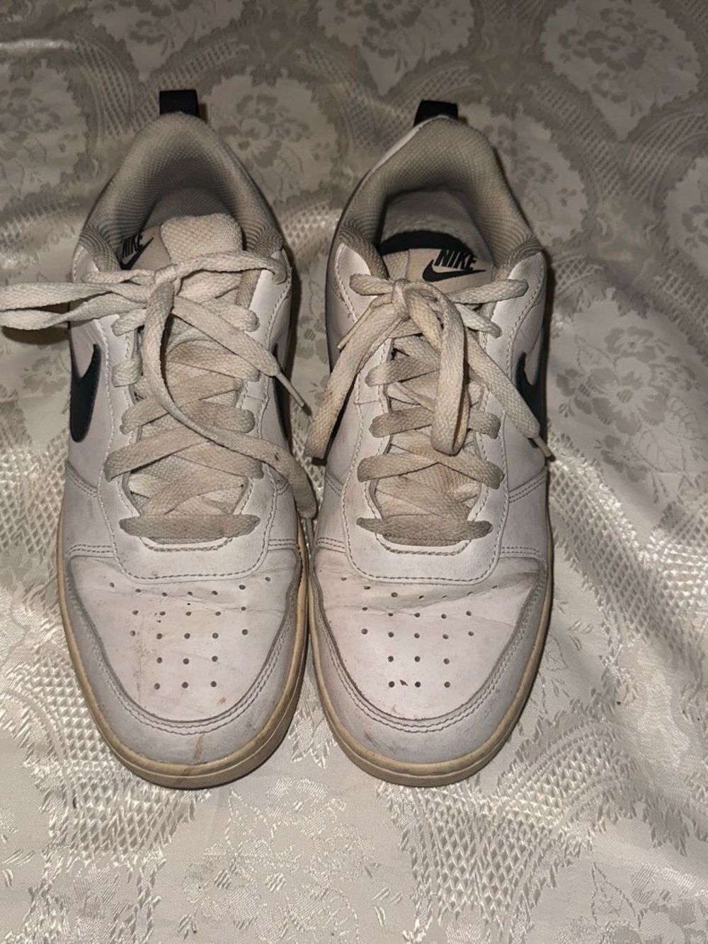 Nike White Low-Top Men’s Sneakers with Black Swoosh